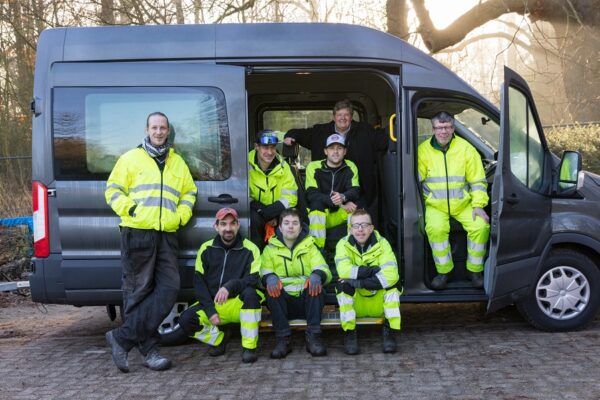 Team tuin onderhoud voor bus